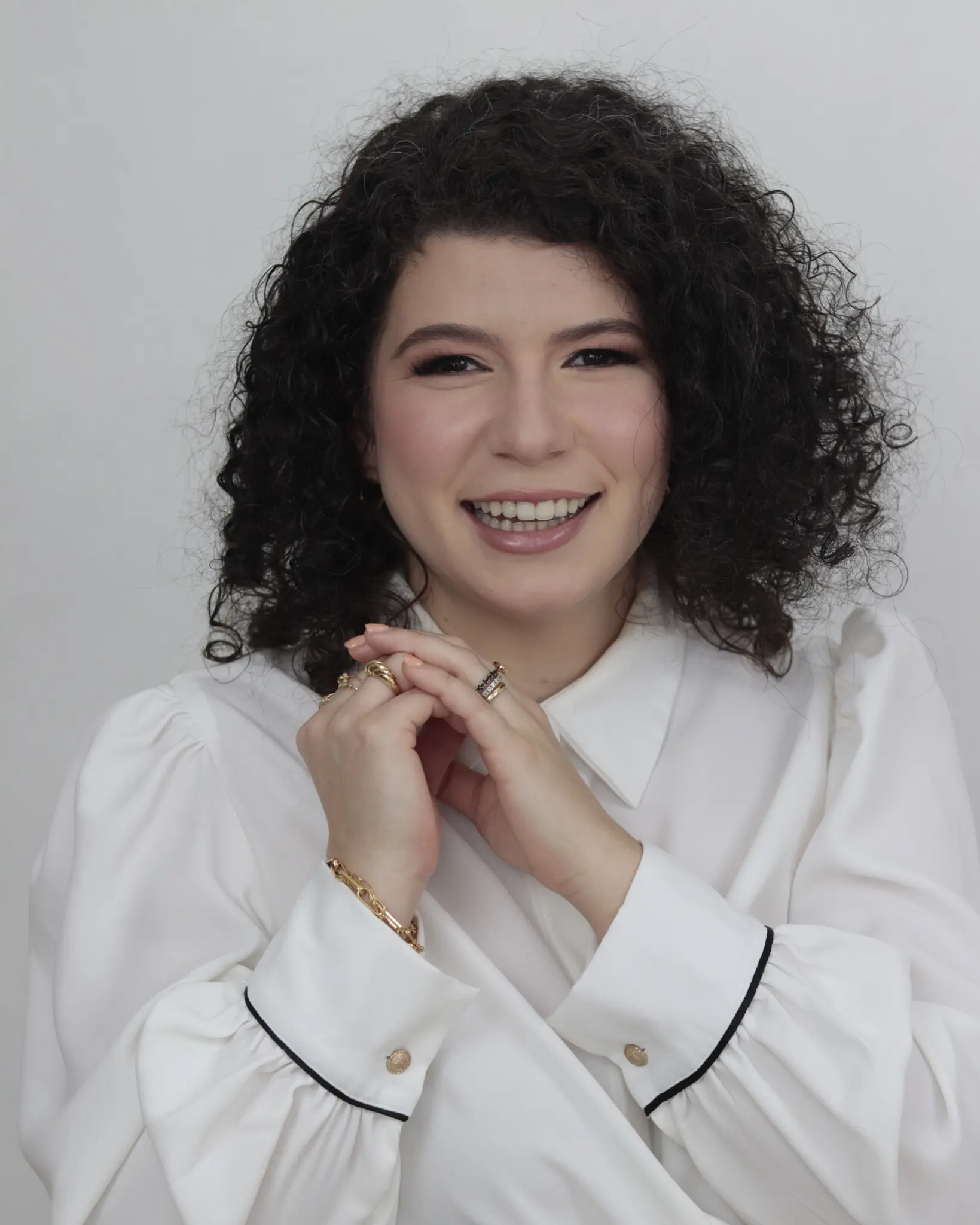 Professional portrait of Dr. Fernanda Vieira smiling Professional portrait of Dr. Fernanda Vieira smiling